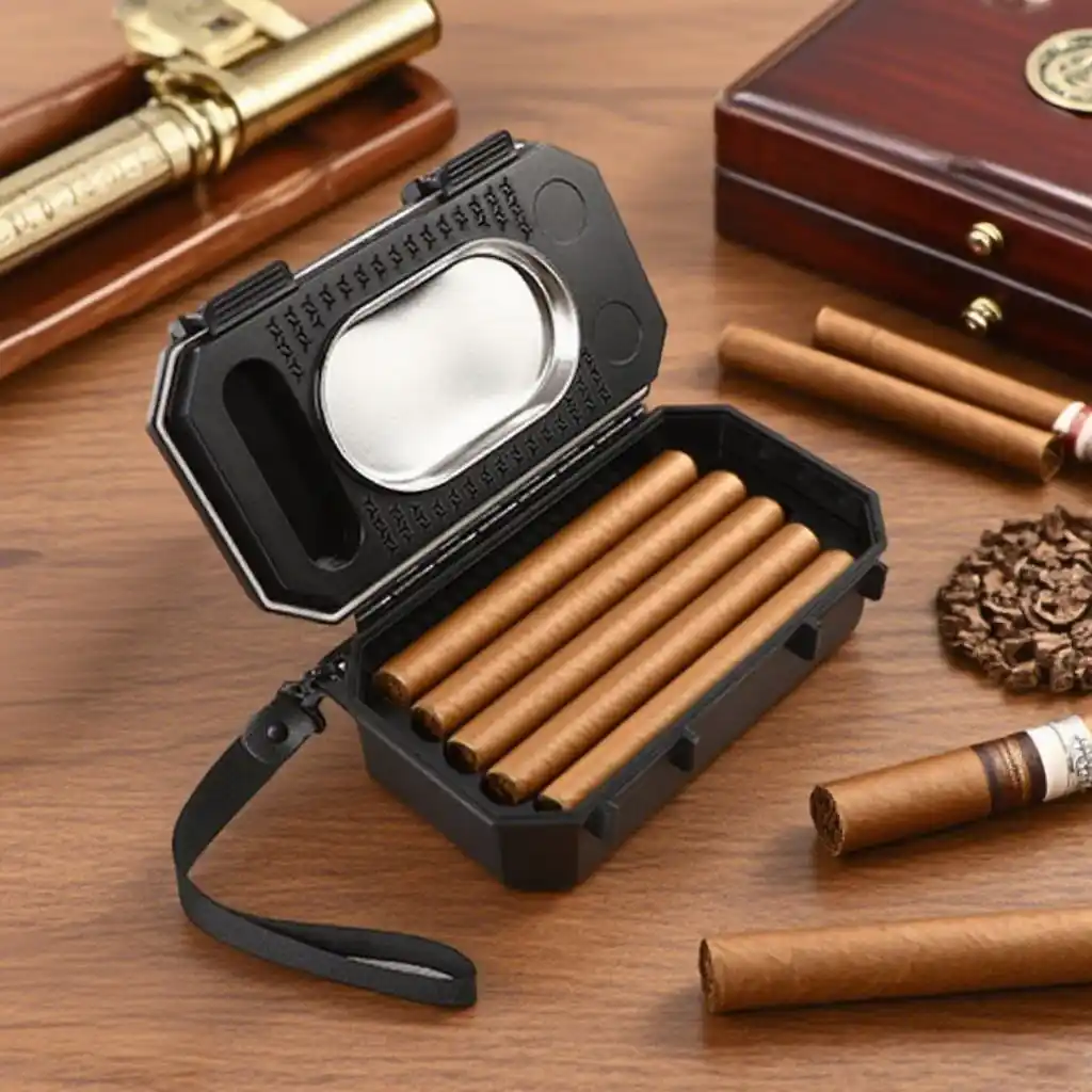 ProTravelHumidors T10 – Tactical Cigar Case 10‑Cigar (Matte Black) 7 ProTravelHumidors open black tactical cigar travel case holding five cigars on a wooden table – integrated stainless steel ashtray and wrist strap
